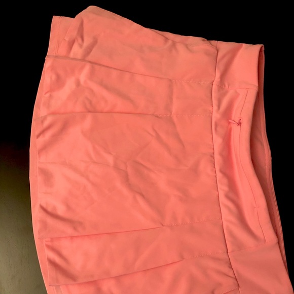 Pink tennis skort with pleated back - Picture 1 of 3